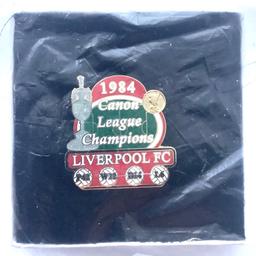 1984 League Champions 
A Liverpool victory pin badge issued by Danbury Mint. 
This badge celebrates Liverpool winning the First Division title in the 1983-84 season. 
It measures 35mm x 35mm. 
No fact card. 
The badge is still sealed in its original packaging. 
In as new condition. 
£9.99 ono.