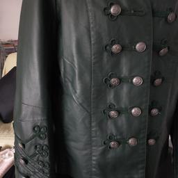 Brand new Dark olive green military looking jacket.
will fit size16 or large 14. leather look.
lovley paisley lining. button detail on cuffs down front. look good on. very soft comfortable. nero type coller.
excellent new condition had it too long to take back. good with a dress or trousers.