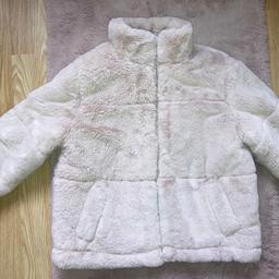 Thick fluffy jacket/ coat. Brand new without tags. Bought for daughter never wore. Has toggles to alter fit. Really fluffy and thick bought from new look for £35 collection WF2