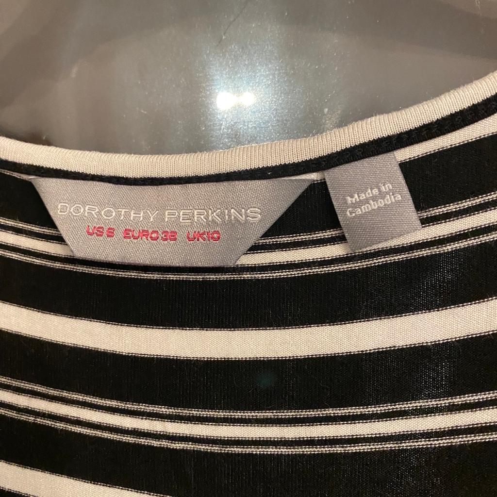 Ladies, black & white striped, long summer dress. Sleeveless with a cross-over front & a belt. From Dorothy Perkins, in really good condition. Size 10.