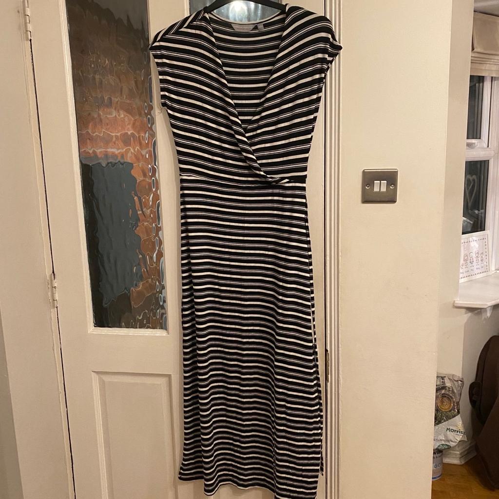 Ladies, black & white striped, long summer dress. Sleeveless with a cross-over front & a belt. From Dorothy Perkins, in really good condition. Size 10.