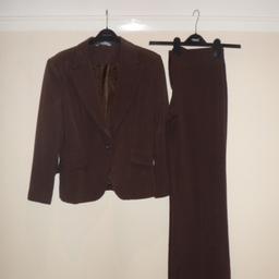 For Sale
Dorothy Perkins short jacket in a black and silver fleck has a button at the front and a short split at the back and is hip length/Size 12 Red Herring suit in brown the jacket is a hip length with a button at the font. The trousers are straight leg and have four buttons at the top.
