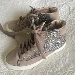 Zara Girls Trainers Brand New Never Worn
No box provided
 Size 29 Beige with Metallic Sparkle & White Soles and beige laces.
A great pair of trainers.