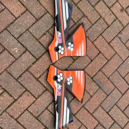 A pair of used ktm 125cc side fairings. Can post at extra cost