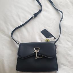 Ladies cross body/shoulder bag. navy blue.cost £25 will sell for. £9 never been used. make a nice gift.