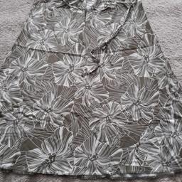 BNWOT M&S khaki green and cream mix floral design viscose skirt size 14. Length 30 inches. Elasticated waist. Lovely quality item. From smoke and pet free home.  Check out my other items, happy to combine postage for multiple purchases or collection from DL5. Thanks for looking.