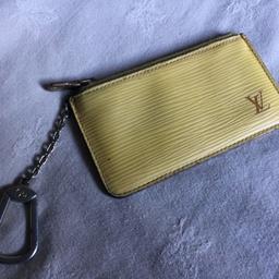 Louis Vuitton Epi Yellow Key Holder Coin Purse
Some tarnish and scratches on hardware, rubs on edges and corners, signs of used on leather part as seen on photos. Hence, the price!
Grab some bargain!