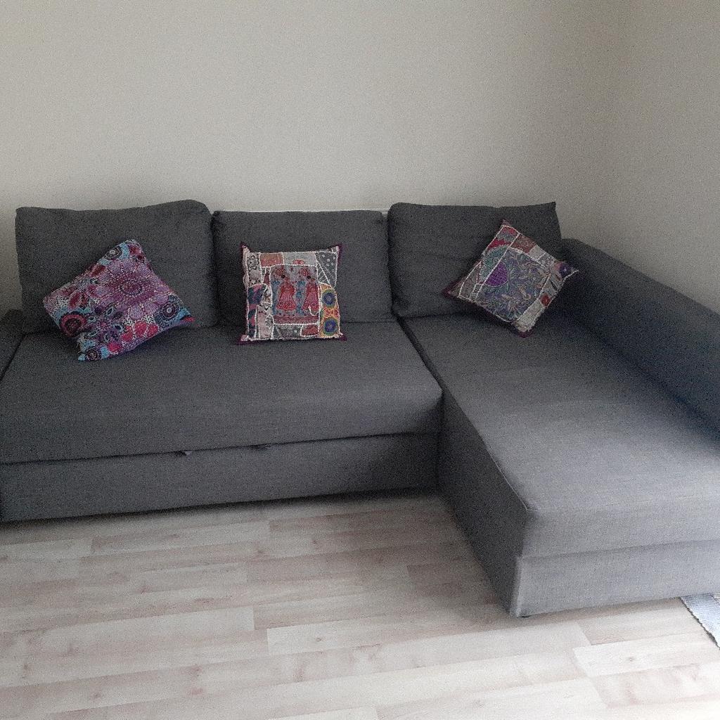 Corner sofa-bed with storage in dark grey colour and left hand facing arm. Very good condition and easy to (dis)assemble. Measurements in one of the pictures. Collection only. Offers accepted. Cushions included.