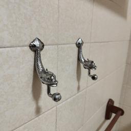 Fish design wall mounted chromed metal toilet roll holder. can also be used as a towel rail (10mm diameter rail).. towel rail and toilet roll bar not included...it's just the 2 brackets