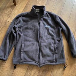 Men fleece coat medium size,used grey please see the pictures and see the pictures and see my other items for sale a pet and smoke free house thanks.