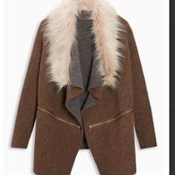 suitable for size 12 to 18 depending how you like the fit
coat and cardigan style 
fur detachable collar 
grey brown 
RRP £65 
BARGAIN - BRAND NEW IWTH TAGS IN PACKAGING 

CHECK OUT MY OTHER LISTINGS LOADS FOR SALE