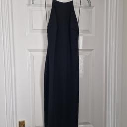 As seen. ladies black backless dress. Thin straps. size 10. worm once. From Pretty little thing. Smoke free home.