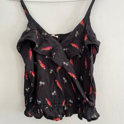 Cute too with adjustable straps very good condition size M