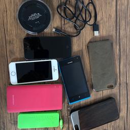 Selling all for £10
Wireless charger with cable. Works to charge from iPhone 8 and higher.
2 power banks, green one works fine, the bigger one no. 
iPhone 5, iPhone 5S - both working but have FMI on. That means you won’t be able to use them.
Huawei was working fine but battery died completely. Don’t know now