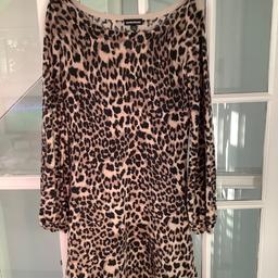 A great animal print dress from Warehouse with long sleeves in a wool like acrylic, in perfect order. Can send or collect
