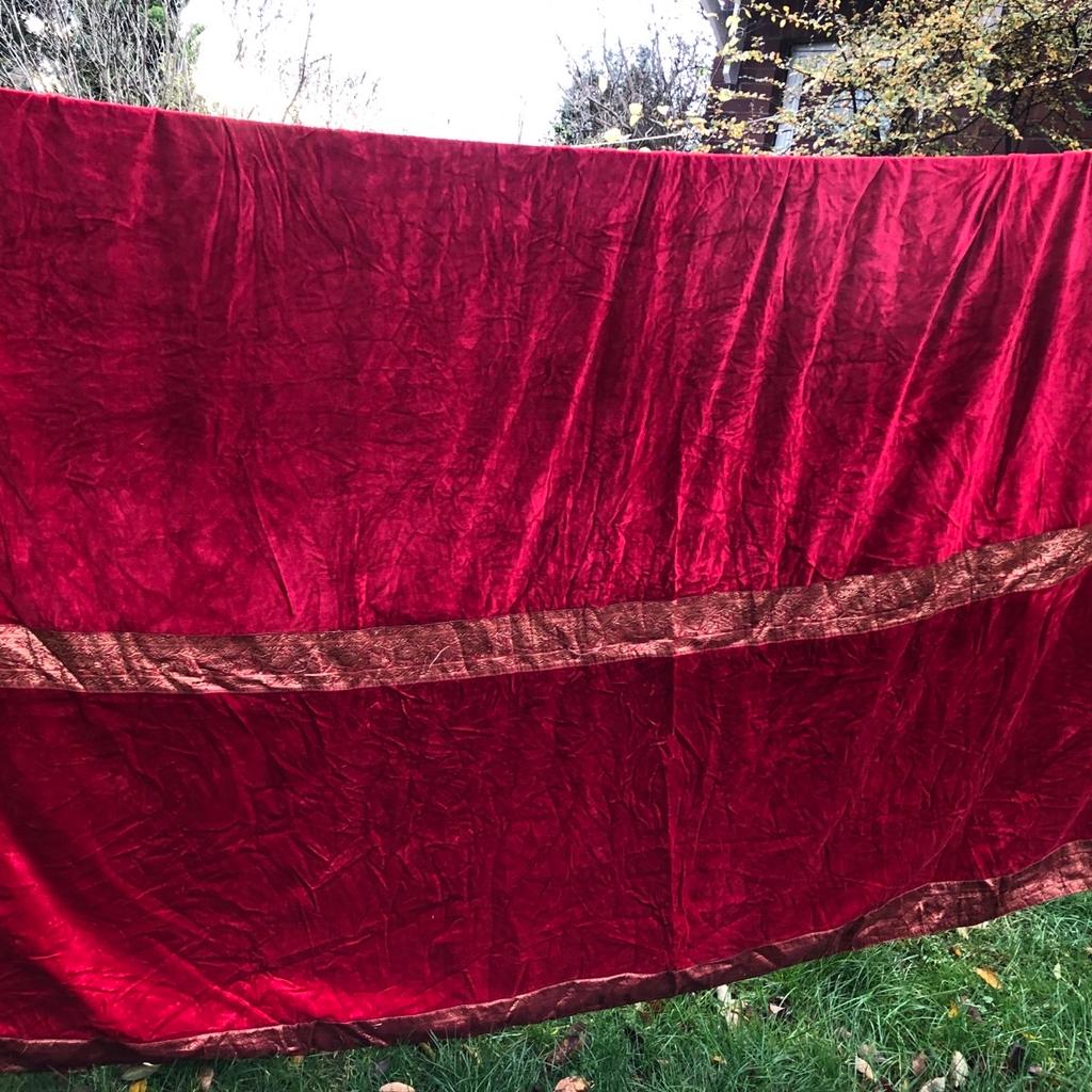 Gorgeous vintage velvet throw.. It’s a really large heavy velvet throw. Rich red with lots of gold brocade details. Amazing wood bead with gold tassels to corners. One tassel is missing but bead is there so it’s easy to replace the tassel. Looks really amazing as a throw on a sofa or bed. . You won’t be disappointed . I just haven’t room for this so unfortunately selling. Beautiful quality item