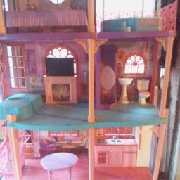 pink Barbie house with lift and lots of accessories