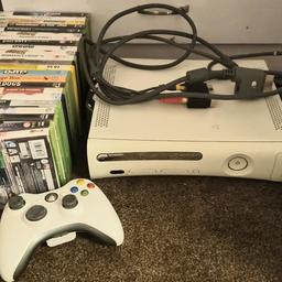 White xbox 360 console,leads,wireless controller ,21 games 
Been well looked after only selling due to upgrading console