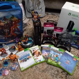 xbox 360 bundle
includes
console inbox
2 x controllers
2 xnew rechargeable battery packs
disney infinity  2.0
disney infinity carry bag
disney infinity characters x 7
sky lander   portal 
sky lander characters  x 10
sky lander bag
sky lander game
mine craft game story mode
mine craft game xbox 360
fifa 2009 game 
headset unused
comes in original box hardly used
i cannot post collection only