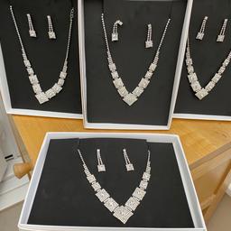 Sparkling necklace and matching earrings 
All new in box 
Excellent gifts 
£3.00 each or 2 for £5.00