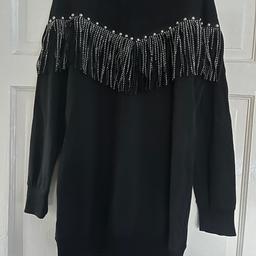 JUMPER DRESS OR CAN BE WORN AS JUST A JUMPER! 😊 PICTURE DOESN’T DO NO JUSTICE, TASSLE’S HAVE A LOVELY LITTLE SPARKLE ON THEM! ✨ BARELY WORN, IMMACULATE CONDITION..👌🏽 SIZE S/M (8-12 ROUGHLY)