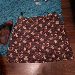 short skirt size 14 nice with tights , flowery pattern