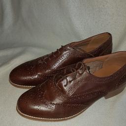 Ladies New Look Brown Leather Brogues Size 7 In Fantastic condition. See photos for condition. I can offer try before you buy option but if viewing on an auction site viewing STRICTLY prior to end of auction.  If you bid and win it's yours. Cash on collection or post at extra cost which is £4.55 Royal Mail 2nd class signed for. I can offer free local delivery within five miles of my postcode which is LS104NF. Listed on five other sites so it may end abruptly. Don't be disappointed. Any questions please ask and I will answer asap.