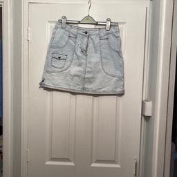 Light denim skirt, size 12. Pockets and a zip. at the front and pockets at the back. Hardly been worn. Open to offers