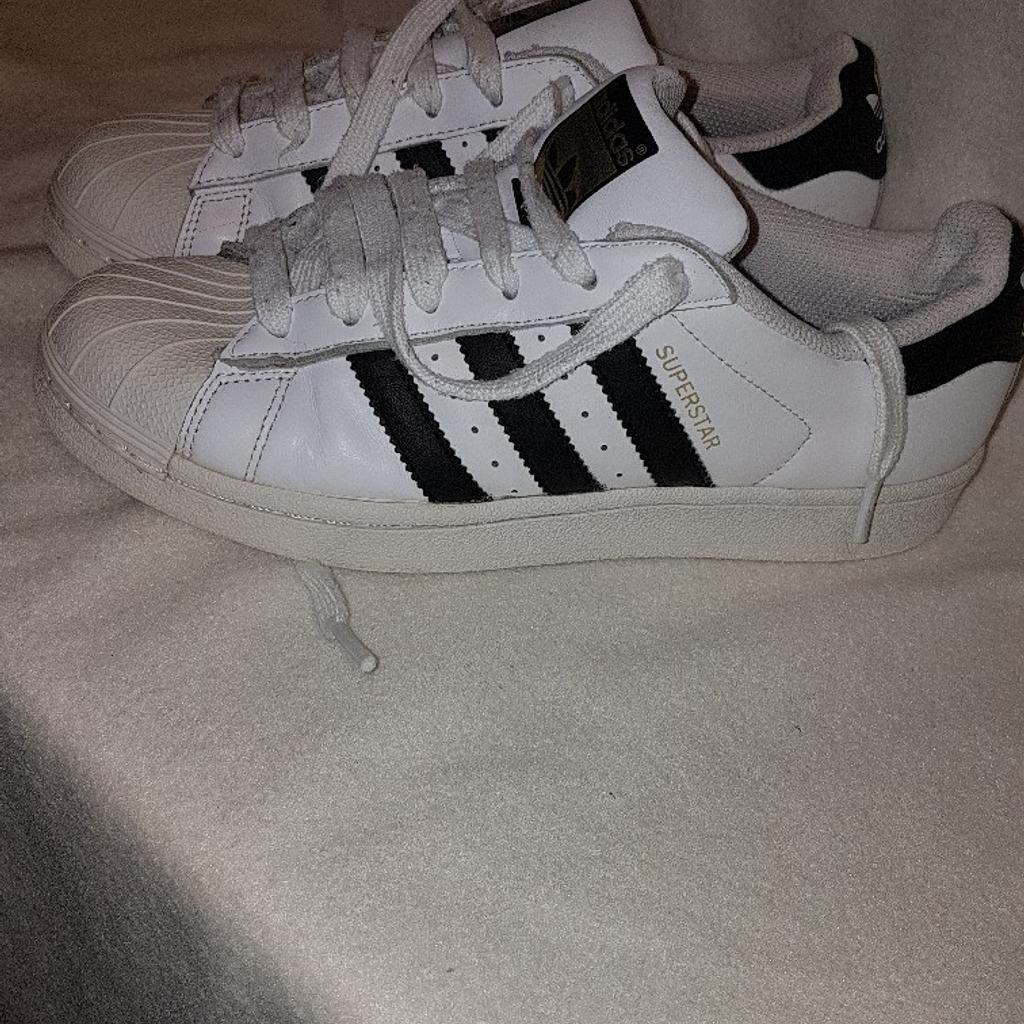 Adidas Superstar Trainers UK size 4 in very good condition. See photos for condition. I can offer try before you buy option but if viewing on an auction site viewing STRICTLY prior to end of auction.  If you bid and win it's yours. Cash on collection or post at extra cost which is £4.55 Royal Mail 2nd class signed for. I can offer free local delivery within five miles of my postcode which is LS104NF. Listed on five other sites so it may end abruptly. Don't be disappointed. Any questions please ask and I will answer asap.