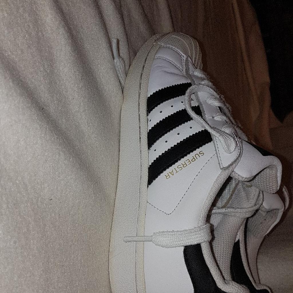 Adidas Superstar Trainers UK size 4 in very good condition. See photos for condition. I can offer try before you buy option but if viewing on an auction site viewing STRICTLY prior to end of auction.  If you bid and win it's yours. Cash on collection or post at extra cost which is £4.55 Royal Mail 2nd class signed for. I can offer free local delivery within five miles of my postcode which is LS104NF. Listed on five other sites so it may end abruptly. Don't be disappointed. Any questions please ask and I will answer asap.