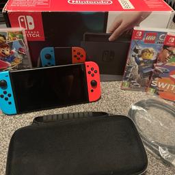 Comes with 3 games 
A carry case
And box 
Complete with charger and hdmi and the other things you see in the picture 

Smoke and pet free home 

Collection from b67