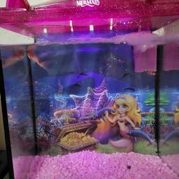 pink mermaid fish tank only had it few months comes with pink gravel and pump only selling has I've had a bigger one £35 ono (can deliver local)