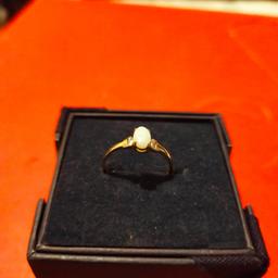 i have for sale a pretty 9ct gold single opal ring fully hallmarked size K, collection from darlington dl1 or can post,paypal accepted please do not put in offers with delivery as i cannot access those thanks no offers cheap little ring