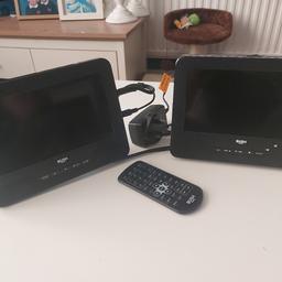 x2 Bush dvd player for in car entertainment  comes with seat fittings and you can also use a memory card in fantastic condition and can be seen working.