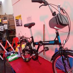 as new folding bike with extras stockport area for collection.