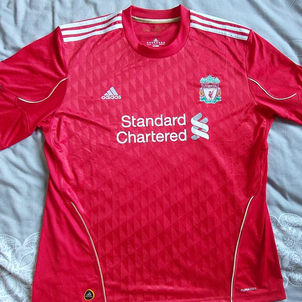 Brand new without tags.

Liverpool Home Shirt from 2011/12.

Original not modern reproduction.

Size is 2XL