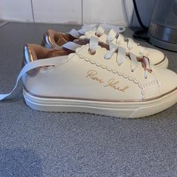 Girls river island trainers never been worn . White and rose gold
