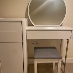 Next white dressing table with mirror and grey stall. Three drawers and a cupboard. 
6 months old