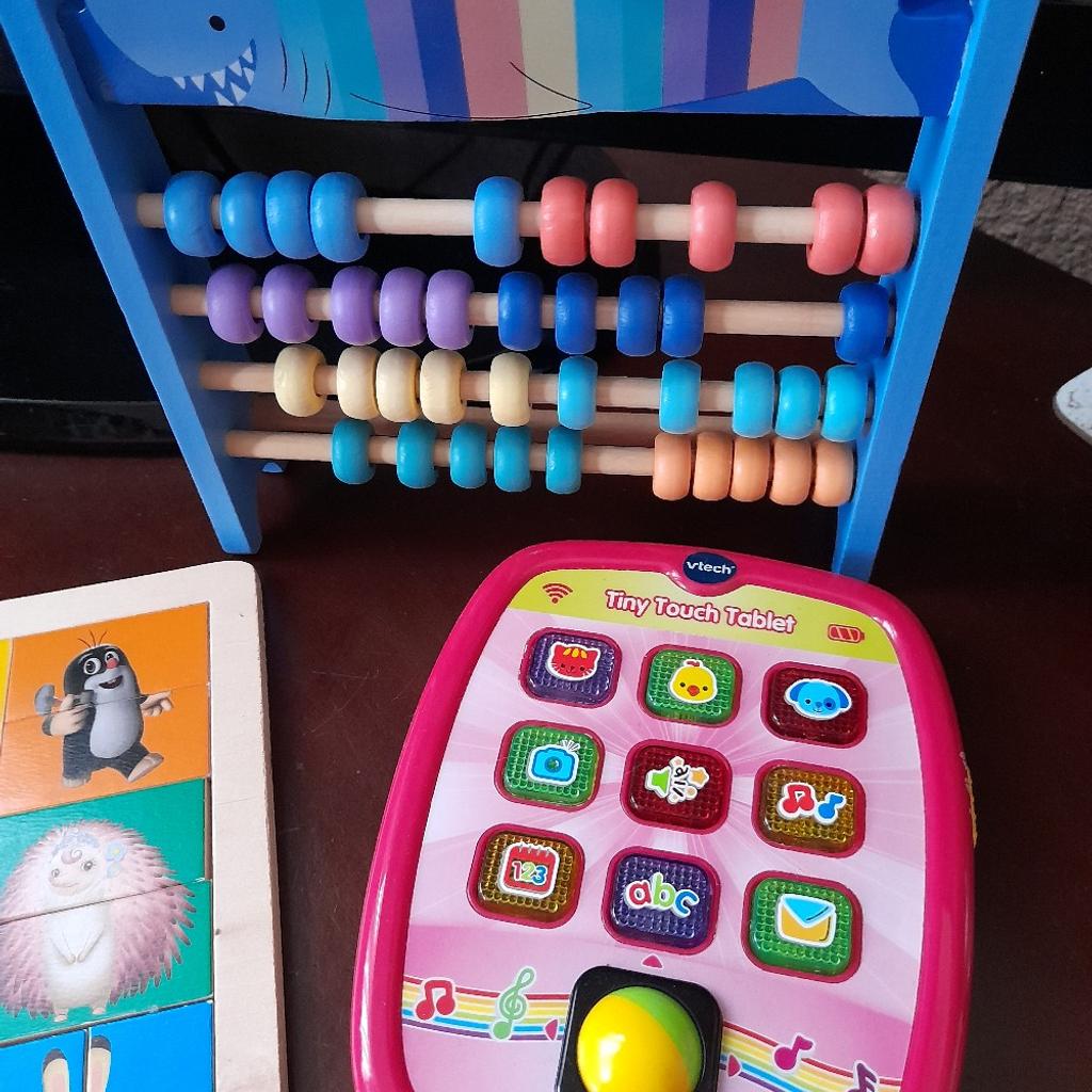 Two wood first jigsaws and abacus.
Electronic phone and v-tech tablet.
Could split items.
As new cond.
Fy3 layton or post