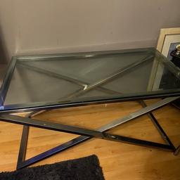 Beautiful stylish glass coffee table. 
Great condition. 
No cracks. 
Bought for just £220. 

4 years old but needs a new home. 

Dimensions 
110cm length x 60cm width x 56cm height. 

Solid Steel frame 

Located : Wandsworth road SW84HW
