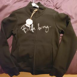Black zip up fleece brand Billabong size 14-16, brand new with tags( label size 5).