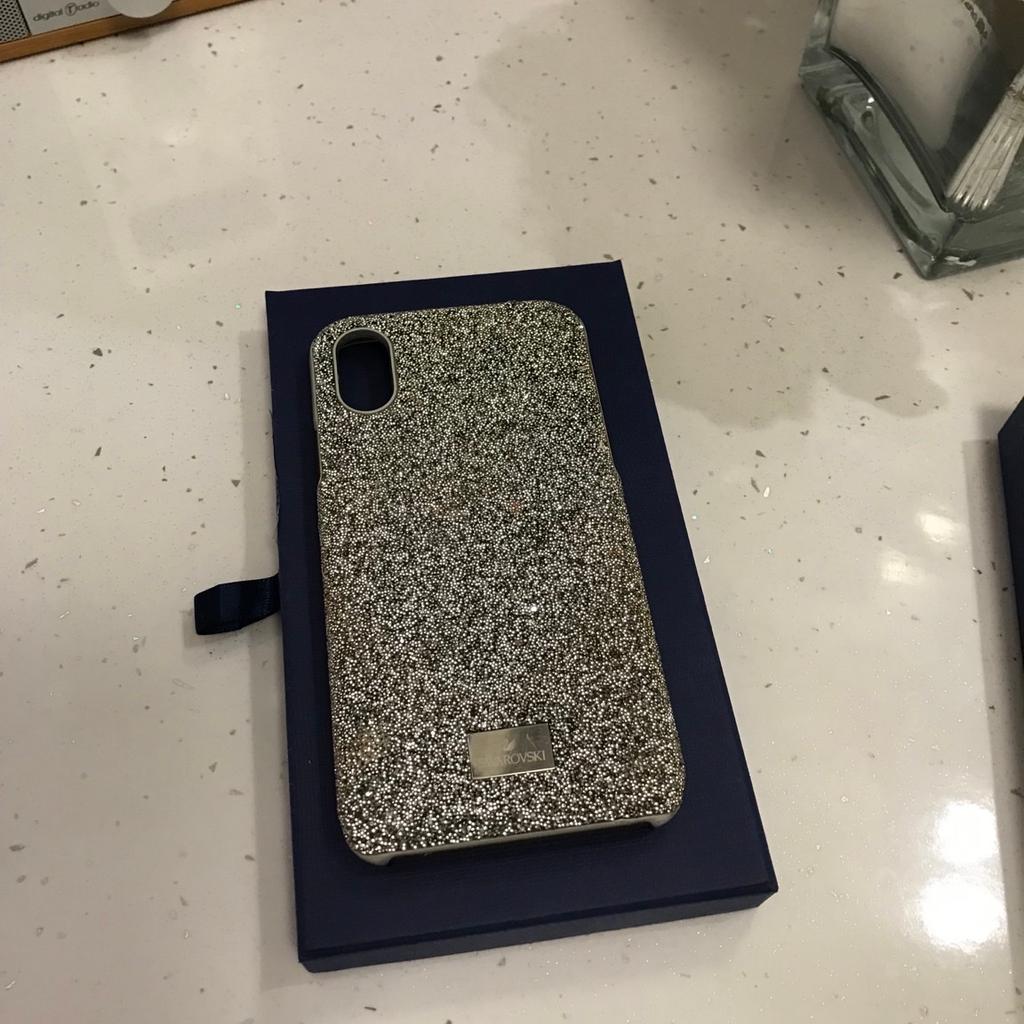 This is a real Swarovski case was a present only used a few times no damage never dropped comes in original box for Apple iPhone X/XS this is used and not new cost over £65 new will accept £30 cash on collection only