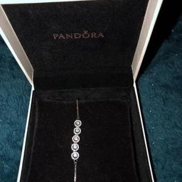 Pandora round slider bracelet 
Comes in original box & bag 

Colour silver 

Collection only because of postal strike