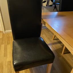Extendable table and 4 black leather chairs extends to 180 cm