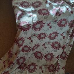 Pair of Laura Ashley Chrysanthemum curtains. Cranberry and gray pattern on cream background. Lined. 100% cotton. Approx. 181 cm long x 125 cm wide (each panel). Pencil pleat heading