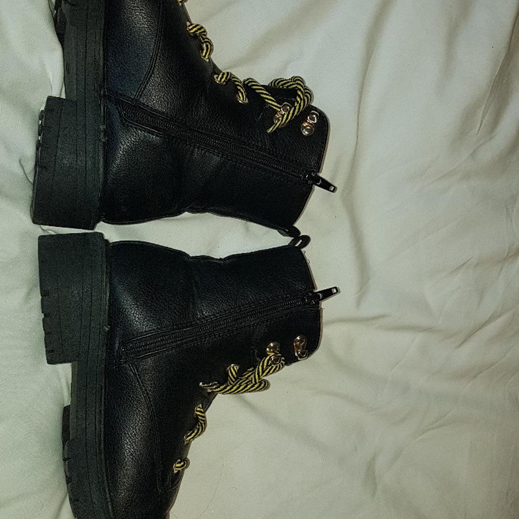 Ladies River Island Zip And Laces Fastening size 6 Boots. Great used condition. Comes with original laces and a brand new pair of authentic Dr Martens Air Wair 90cm laces which really make the boots stand out. Please note only the black zips open and close, the brass coloured zips are just for show. See photos for condition and size. I can offer try before you buy option but if viewing on an auction site viewing STRICTLY prior to end of auction. If you bid and win it's yours. Cash on collection or post at extra cost which is £4.55 Royal Mail 2nd class signed for. I can offer free local delivery within five miles of my postcode which is LS104NF. Listed on five other sites so it may end abruptly. Don't be disappointed. Any questions please ask and I will answer asap.