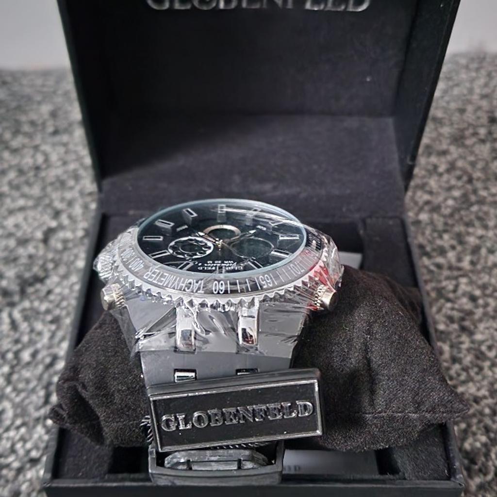 Brand New Globenfeld Jetmaster Black Rubber Strap watch

water resistant to 30m
12/24 time format
Day, date and month features
Alarm with chime
stop watch
watch back light function (for night vision)
textured jet black dial
scissor hands

NO OFFERS