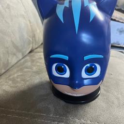 Only selling as my son got a new money box for Christmas.

There is a small black mark on the back and the stand has a slightly damaged where my son dropped it (as per pics) but it does not affect the use.