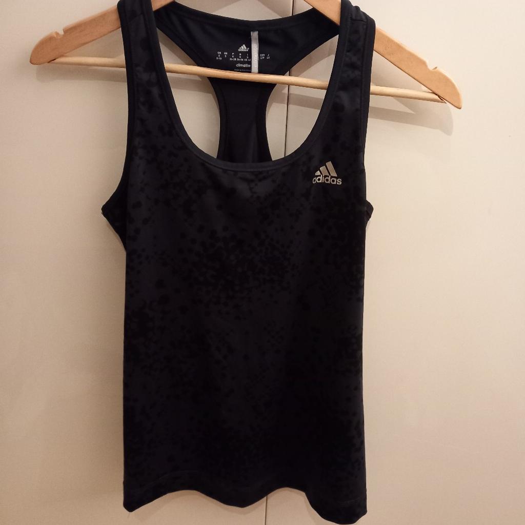 as you can see Adidas sport top fir women in small size (8-10)
