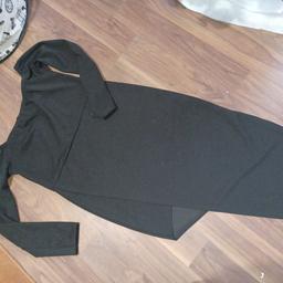 ladies black dress with dropped front shown in pictures from pretty little thing Only worn twice very good condition. £8 collect only.